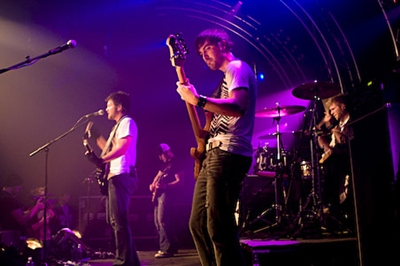 safety-suit-band-on-stage